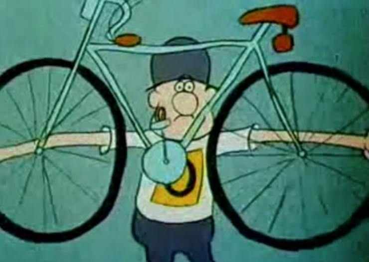 un personaggio dei cartoni animati solleva una bici